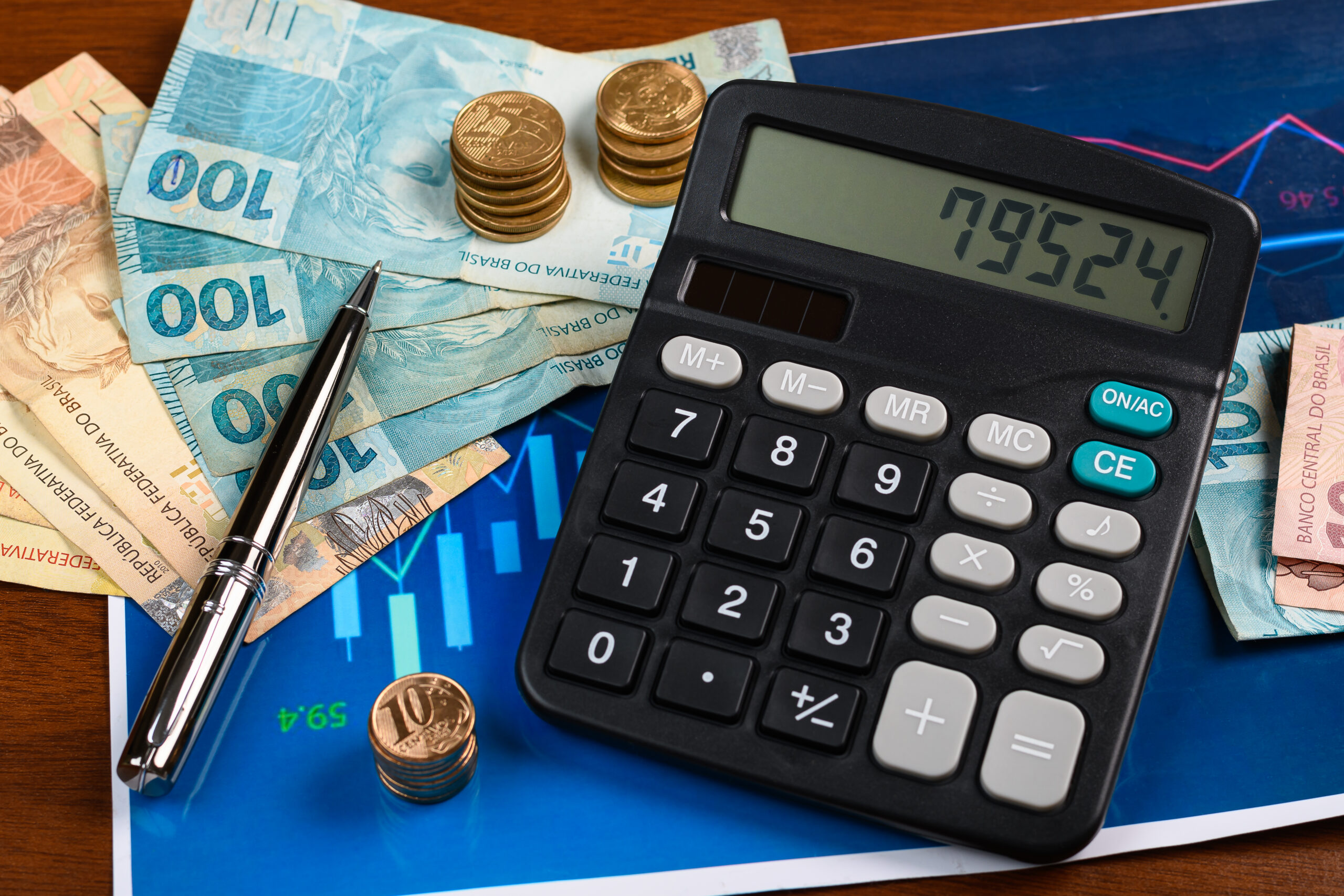 brazilian-money-calculator-graph-financial-analysis-wooden-fund Home